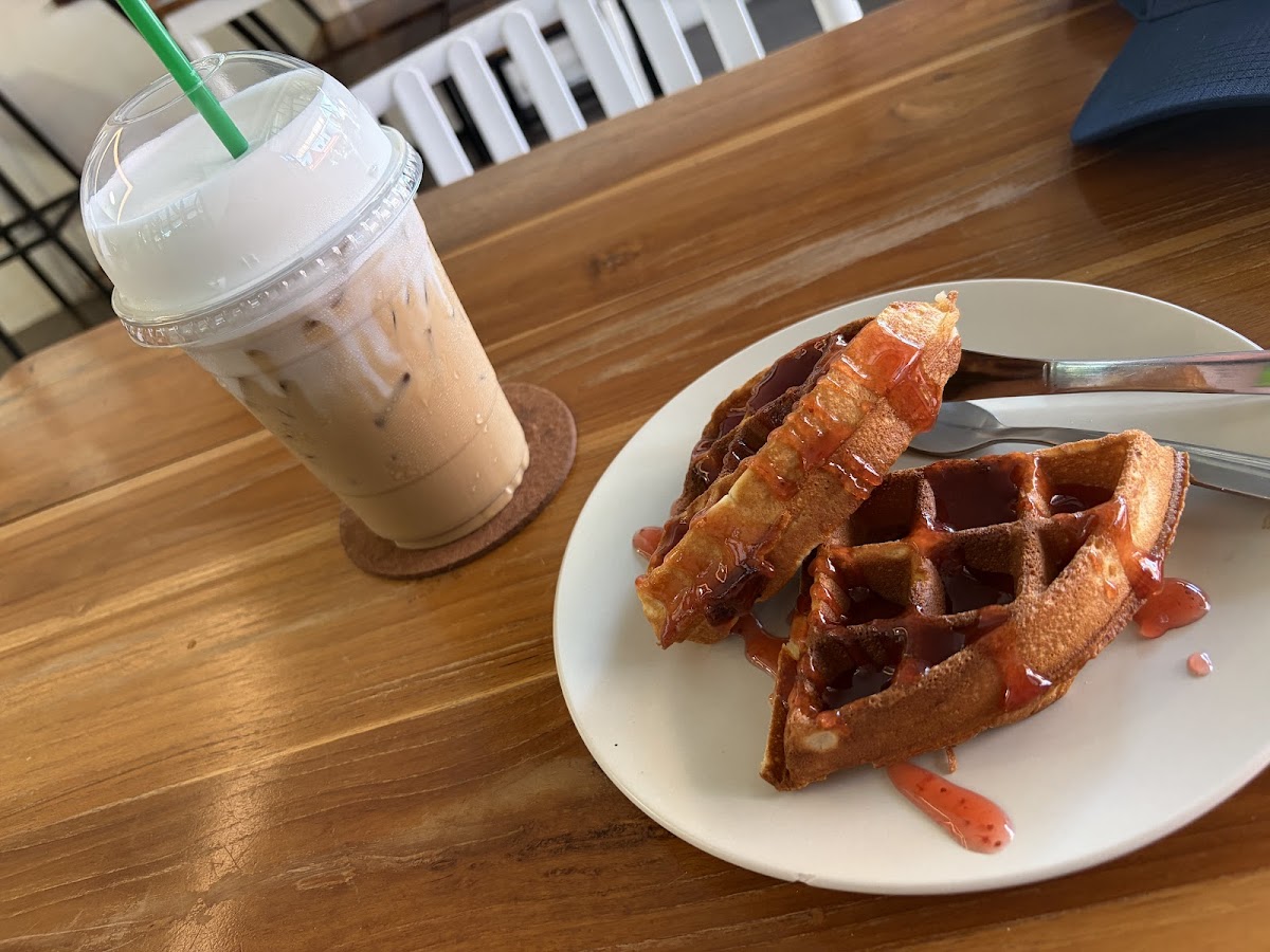 Golden waffles served with iced coffee